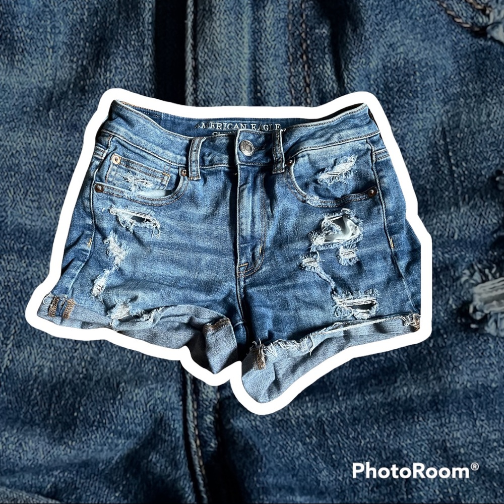 blue ripped jean shorts